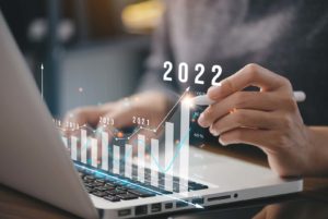 businessman plans increase of positive indicators in the year 2022 to increase business growth and an increase for growing up business