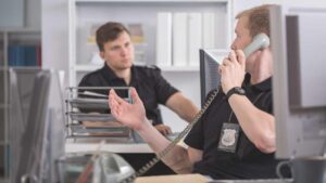 Image of policeman talking on the phone