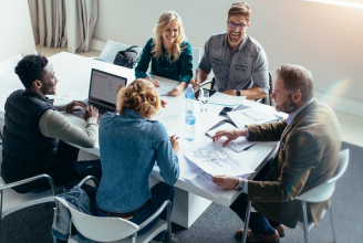 group of office workers at table